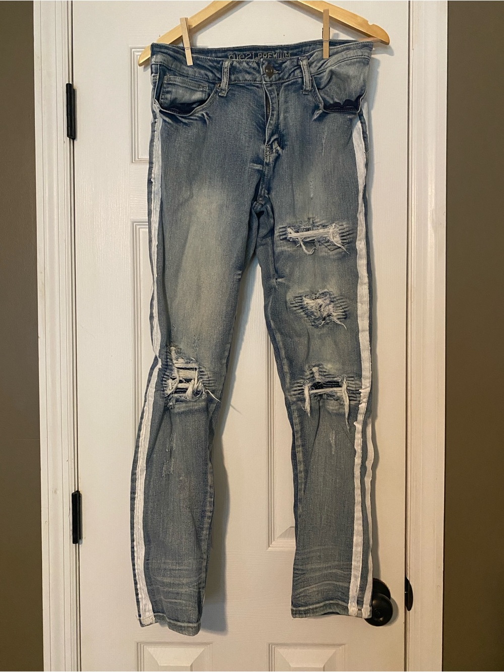 Rue 21 - Distressed Jeans with painted white side stripes and lined ripped holes